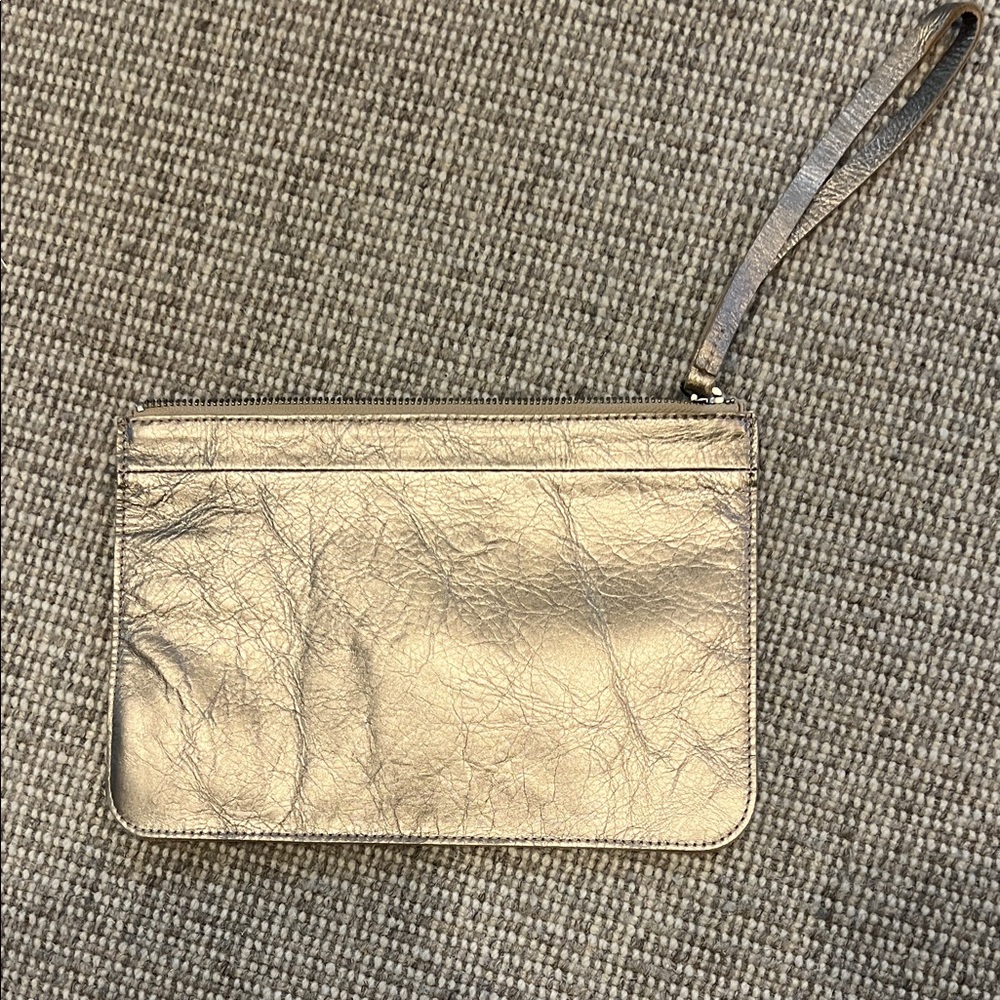 COS gold pouch.   Zip top.